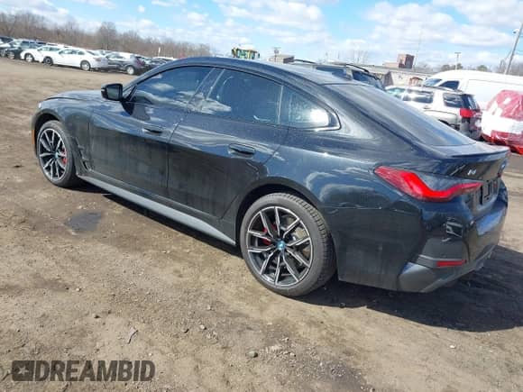 2024 BMW i4 xDrive40 с VIN WBY83FB04RFT19615, выставлен на аукционе IAAI как лот 41679918 с пробегом 3 883 миль миль и . История ставок и продаж доступна на DreamBid. Изображение 3.