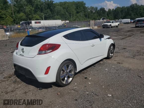 2012 Hyundai Veloster w/Red Int z VIN KMHTC6AD5CU058901, wystawiony jako Copart lot #69244165 z przebiegiem 97 260 mil mil oraz Szkoda całkowita • Salvage title. Historia ofert i sprzedaży dostępna na DreamBid. Obrazek 3.