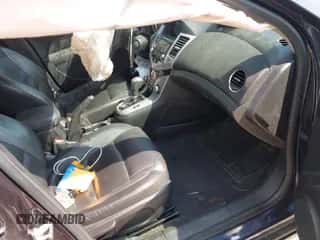 2014 Chevrolet Cruze 2LT z VIN 1G1PE5SB3E7128428, wystawiony jako IAAI lot #43252590 z przebiegiem Nie podano mil oraz . Historia ofert i sprzedaży dostępna na DreamBid. Obrazek 5.