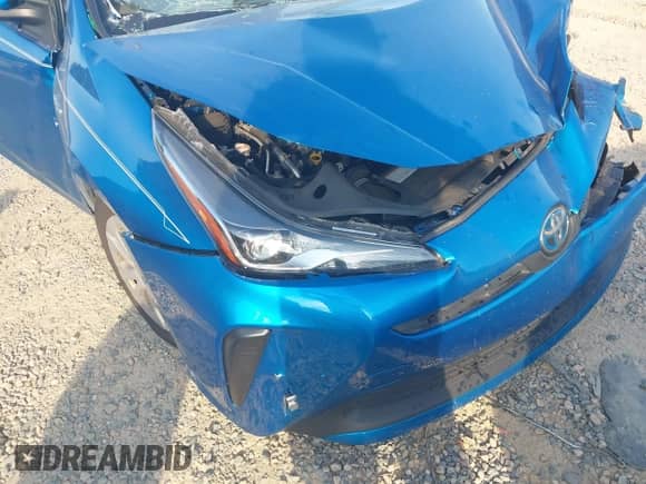 2021 Toyota Prius L Eco with VIN JTDKAMFU1M3136133, listed as a IAAI auction lot 43285926 with 49,911 mi miles and . Bid and sale history available at DreamBid. Image 6.