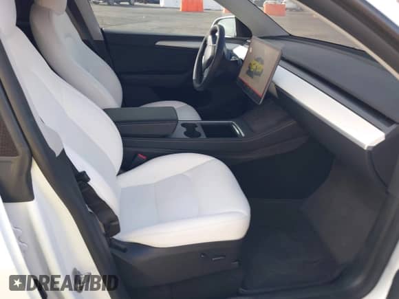 2023 Tesla Model Y Long Range with VIN 7SAYGDEE0PA135579, listed as a IAAI auction lot 43196811 with 44,886 mi miles and . Bid and sale history available at DreamBid. Image 5.