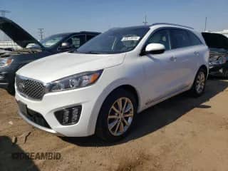 2017 Kia Sorento SXL z VIN 5XYPKDA59HG336486, wystawiony jako Copart lot #52613975 z przebiegiem Nie podano mil oraz Szkoda całkowita • Salvage title. Historia ofert i sprzedaży dostępna na DreamBid. Obrazek 1.