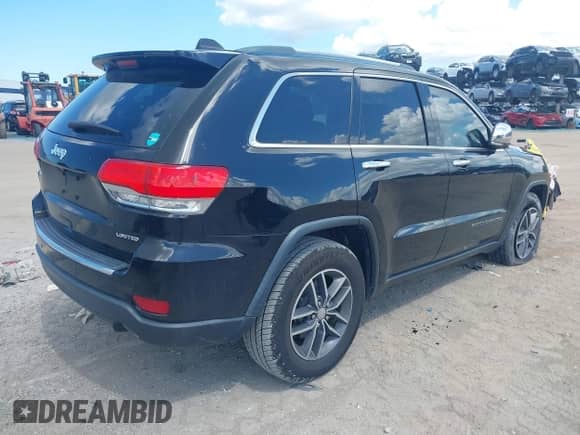 2018 Jeep Grand Cherokee Sterling with VIN 1C4RJEBGXJC339182, listed as a IAAI auction lot 43233744 with 80,453 mi miles and . Bid and sale history available at DreamBid. Image 4.