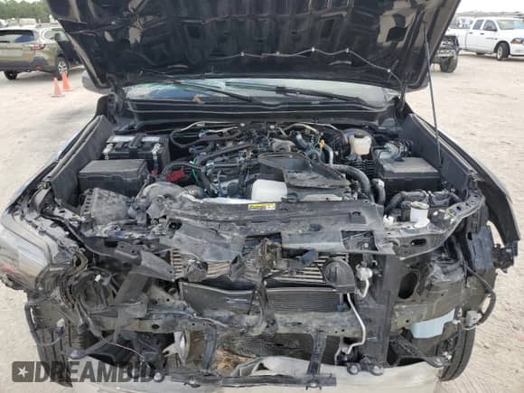 2025 Toyota Tacoma SR z VIN 3TYKD5HN0ST022563, wystawiony jako Copart lot #86462305 z przebiegiem 12 812 mil mil oraz Szkoda całkowita • Salvage title. Historia ofert i sprzedaży dostępna na DreamBid. Obrazek 11.