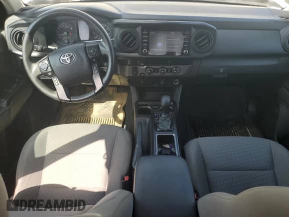 2021 Toyota Tacoma SR с VIN 3TYRX5GN2MT032215, выставлен на аукционе Copart как лот 72005915 с пробегом 139 908 миль миль и Чистый • Clean title. История ставок и продаж доступна на DreamBid. Изображение 8.