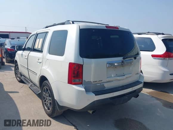 2015 Honda Pilot Touring с VIN 5FNYF3H92FB007774, выставлен на аукционе IAAI как лот 43083627 с пробегом 148 676 миль миль и . История ставок и продаж доступна на DreamBid. Изображение 3.