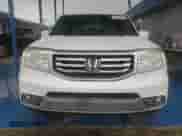 2014 Honda Pilot Touring z VIN 5FNYF4H94EB051537, wystawiony jako Copart lot #86239175 z przebiegiem 128 827 mil mil oraz Czysty tytuł • Clean title. Historia ofert i sprzedaży dostępna na DreamBid. Obrazek 5.