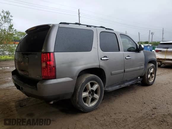 2007 Chevrolet Tahoe LT with VIN 1GNFC13037R300518, listed as a Copart auction lot 63928304 with 298,961 mi miles and Salvage title. Bid and sale history available at DreamBid. Image 3.