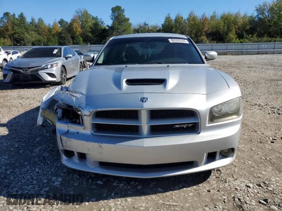 2007 Dodge Charger SRT-8 с VIN 2B3KA73W47H730807, выставлен на аукционе Copart как лот 80328244 с пробегом 202 455 миль миль и Списание • Salvage title. История ставок и продаж доступна на DreamBid. Изображение 5.