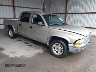 2003 Dodge Dakota SLT with VIN 1D7HL48N93S303911, listed as a IAAI auction lot 41536555 with 383,306 mi miles and . Bid and sale history available at DreamBid. Image 1.
