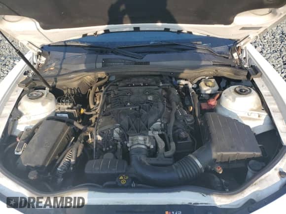 2015 Chevrolet Camaro LS with VIN 2G1FB1E36F9299918, listed as a Copart auction lot 60706165 with 128,996 mi miles and Salvage title. Bid and sale history available at DreamBid. Image 11.