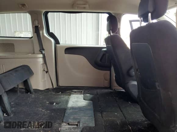 2014 Dodge Grand Caravan SE with VIN 2C4RDGBG4ER103210, listed as a Copart auction lot 68393365 with 275,424 mi miles and Salvage title. Bid and sale history available at DreamBid. Image 11.