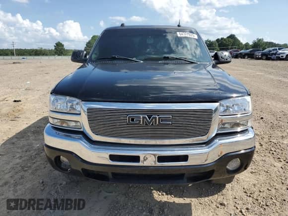 2004 GMC Sierra 1500 SLT with VIN 2GTEK13T941332525, listed as a Copart auction lot 64721925 with 242,636 mi miles and Salvage title. Bid and sale history available at DreamBid. Image 5.