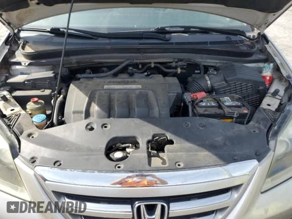 2007 Honda Odyssey EX-L с VIN 5FNRL38797B410485, выставлен на аукционе Copart как лот 70651925 с пробегом 144 733 миль миль и Чистый • Clean title. История ставок и продаж доступна на DreamBid. Изображение 12.