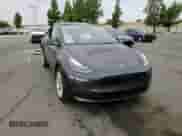 2024 Tesla Model Y Long Range z VIN 7SAYGAEE7RF020109, wystawiony jako Copart lot #84736305 z przebiegiem 16 815 mil mil oraz Szkoda całkowita • Salvage title. Historia ofert i sprzedaży dostępna na DreamBid. Obrazek 13.