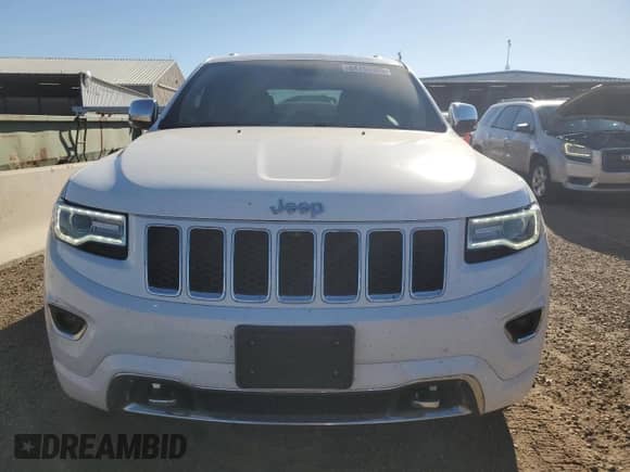 2016 Jeep Grand Cherokee Overland with VIN 1C4RJFCG4GC330314, listed as a Copart auction lot 84763365 with 155,992 mi miles and Salvage title. Bid and sale history available at DreamBid. Image 5.