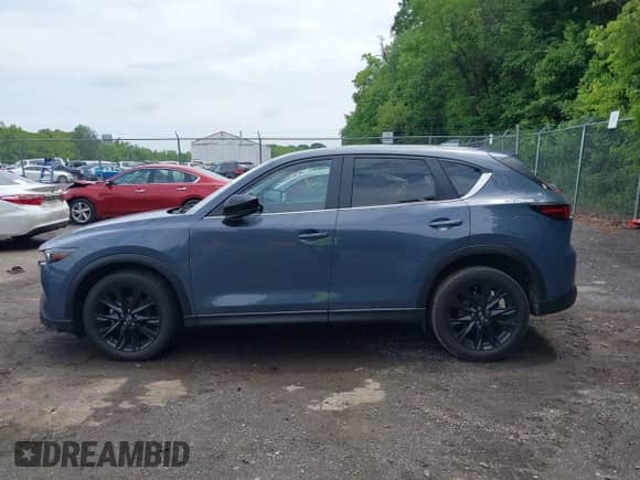 2023 Mazda CX-5 S Carbon Edition z VIN JM3KFBCM8P0223695, wystawiony jako IAAI lot #42379352 z przebiegiem 41 849 mil mil oraz . Historia ofert i sprzedaży dostępna na DreamBid. Obrazek 14.