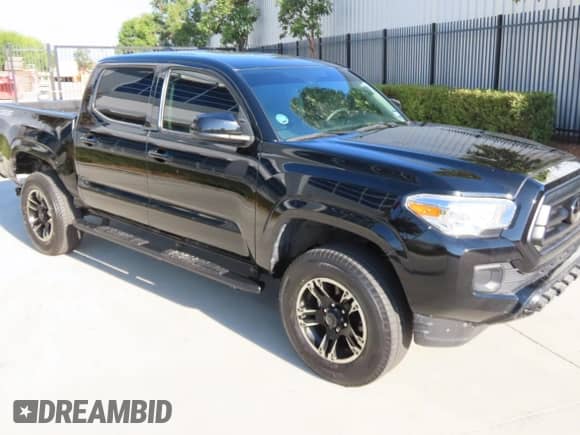 2023 Toyota Tacoma SR z VIN 3TYCZ5AN2PT134806, wystawiony jako Copart lot #85576265 z przebiegiem 26 635 mil mil oraz Czysty tytuł • Clean title. Historia ofert i sprzedaży dostępna na DreamBid. Obrazek 1.