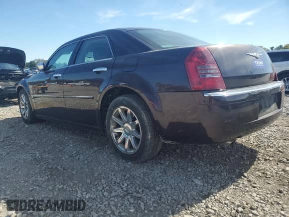 2005 Chrysler 300 C with VIN 2C3AA63H35H104303, listed as a Copart auction lot 82310295 with 128,937 mi miles and Salvage title. Bid and sale history available at DreamBid. Image 2.