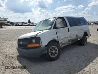 2014 Chevrolet Express Passenger LS with VIN 1GNSGBF48E1184848, listed as a Copart auction lot 81589595 with 143,995 mi miles and Salvage title. Bid and sale history available at DreamBid. Image 1.