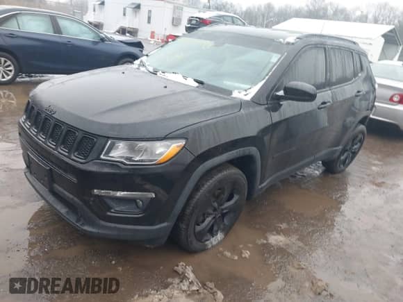 2020 Jeep Compass Latitude with VIN 3C4NJCBB5LT166329, listed as a IAAI auction lot 41554098 with 59,853 mi miles and . Bid and sale history available at DreamBid. Image 2.