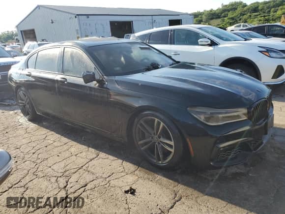 2019 BMW 7 Series 750i xDrive with VIN WBA7F2C53KB240017, listed as a Copart auction lot 65009774 with 11,175 mi miles and Salvage title. Bid and sale history available at DreamBid. Image 4.