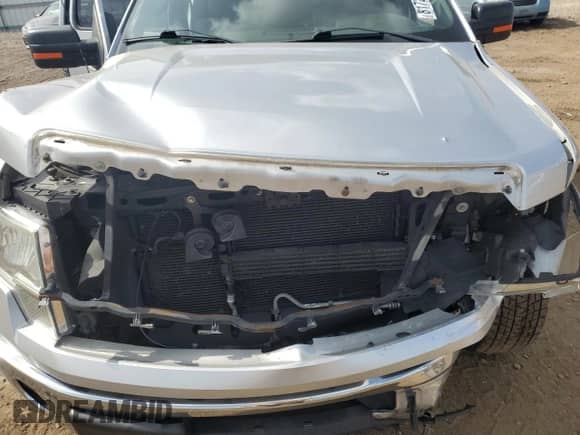 2013 Ford F-150 XLT с VIN 1FTFW1EFXDFD16228, выставлен на аукционе Copart как лот 81722055 с пробегом 121 978 миль миль и Списание • Salvage title. История ставок и продаж доступна на DreamBid. Изображение 11.