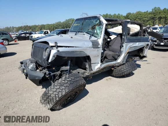 2012 Jeep Wrangler Sport с VIN 1C4AJWAG3CL232403, выставлен на аукционе Copart как лот 48869505 с пробегом Не указан миль и Списание • Salvage title. История ставок и продаж доступна на DreamBid. Изображение 1.