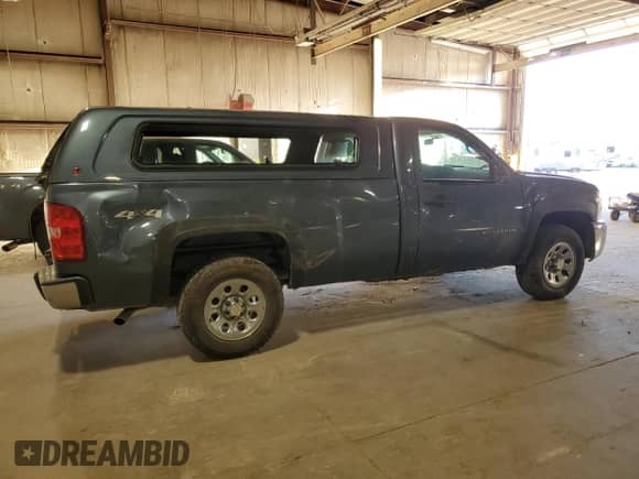 2012 Chevrolet Silverado 1500 Work Truck z VIN 1GCNKPEX6CZ336203, wystawiony jako Copart lot #85278025 z przebiegiem 117 157 mil mil oraz Szkoda całkowita • Salvage title. Historia ofert i sprzedaży dostępna na DreamBid. Obrazek 3.