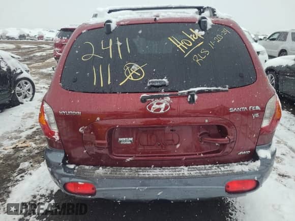 2002 Hyundai Santa Fe GLS z VIN KM8SC73D82U229282, wystawiony jako Copart lot #82037604 z przebiegiem Nie podano mil oraz Szkoda całkowita • Salvage title. Historia ofert i sprzedaży dostępna na DreamBid. Obrazek 6.