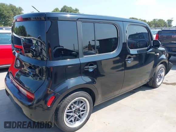 2009 Nissan Cube SL с VIN JN8AZ28R59T127819, выставлен на аукционе IAAI как лот 40032802 с пробегом 138 891 миль миль и . История ставок и продаж доступна на DreamBid. Изображение 4.