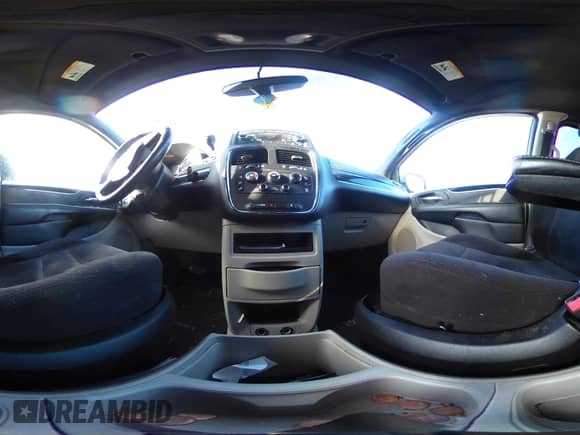 2014 Dodge Grand Caravan American Value with VIN 2C4RDGBG8ER376831, listed as a IAAI auction lot 41379809 with 142,101 mi miles and . Bid and sale history available at DreamBid. Image 18.