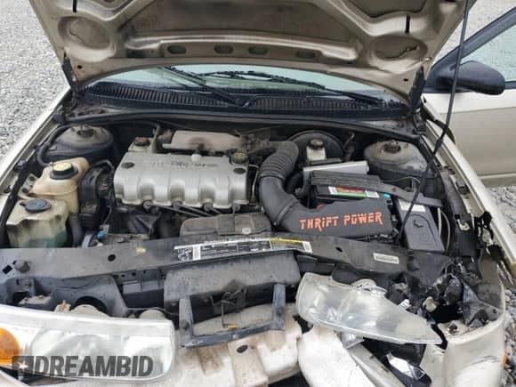 2000 Saturn SL with VIN 1G8ZH5283YZ221335, listed as a Copart auction lot 84196955 with 157,098 mi miles and Salvage title. Bid and sale history available at DreamBid. Image 11.