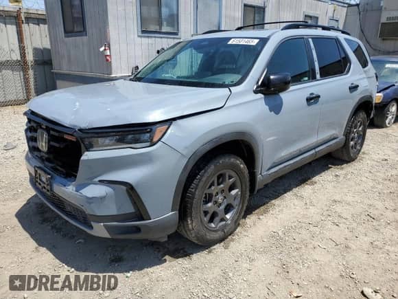 2023 Honda Pilot TrailSport z VIN 5FNYG1H62PB022686, wystawiony jako Copart lot #61501465 z przebiegiem 32 095 mil mil oraz Szkoda całkowita • Salvage title. Historia ofert i sprzedaży dostępna na DreamBid. Obrazek 1.