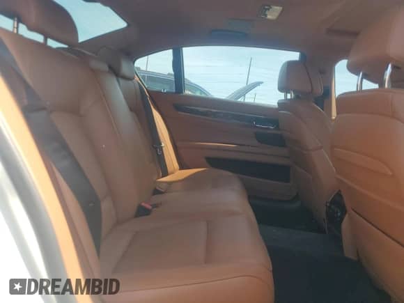 2015 BMW 7 Series 750Li xDrive с VIN WBAYF8C55FD654448, выставлен на аукционе Copart как лот 65222575 с пробегом 106 082 миль миль и Чистый • Clean title. История ставок и продаж доступна на DreamBid. Изображение 10.