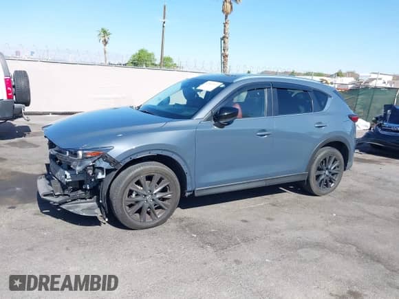 2022 Mazda CX-5 S Preferred z VIN JM3KFBCM2N1565165, wystawiony jako IAAI lot #42507203 z przebiegiem 39 853 mil mil oraz . Historia ofert i sprzedaży dostępna na DreamBid. Obrazek 15.