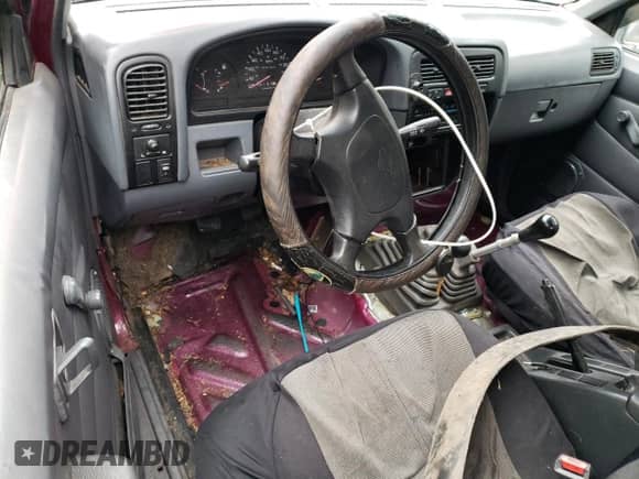 1995 Nissan Frontier SE with VIN 1N6HD16Y1SC324955, listed as a Copart auction lot 42983295 with 266,320 mi miles and Salvage title. Bid and sale history available at DreamBid. Image 8.