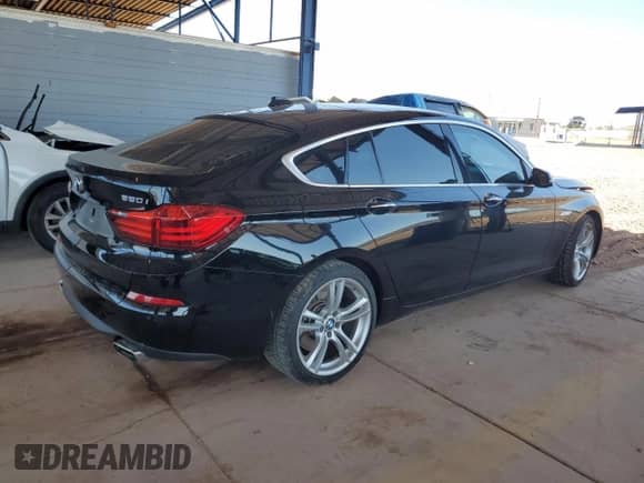 2014 BMW 5 Series с VIN WBA5M6C57ED085937, выставлен на аукционе Copart как лот 63325485 с пробегом 81 652 миль миль и Списание • Salvage title. История ставок и продаж доступна на DreamBid. Изображение 3.