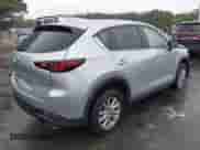 2023 Mazda CX-5 S Select with VIN JM3KFBBM4P0272667, listed as a IAAI auction lot 43014607 with 22,598 mi miles and . Bid and sale history available at DreamBid. Image 4.