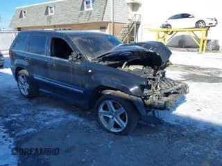 2006 Jeep Grand Cherokee SRT-8 with VIN 1J8HR78376C279785, listed as a IAAI auction lot 41323336 with 112,454 mi miles and . Bid and sale history available at DreamBid. Image 1.
