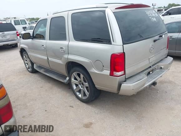 2004 Cadillac Escalade with VIN 1GYEC63T84R224568, listed as a IAAI auction lot 42751107 with 174,987 mi miles and . Bid and sale history available at DreamBid. Image 3.