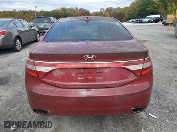 2012 Hyundai Azera с VIN KMHFG4JG7CA151906, выставлен на аукционе Copart как лот 82734055 с пробегом 90 125 миль миль и Чистый • Clean title. История ставок и продаж доступна на DreamBid. Изображение 6.