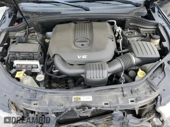 2013 Dodge Durango SXT z VIN 1C4RDHAG9DC695024, wystawiony jako Copart lot #86501155 z przebiegiem 158 842 mil mil oraz Szkoda całkowita • Salvage title. Historia ofert i sprzedaży dostępna na DreamBid. Obrazek 12.