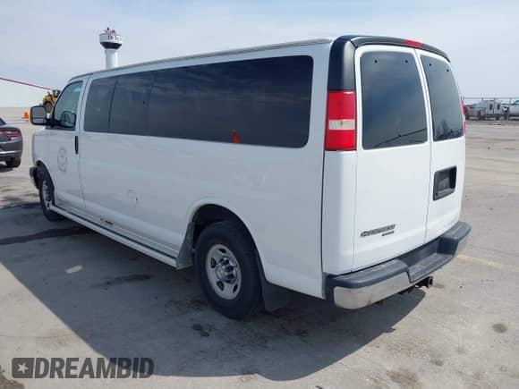 2013 Chevrolet Express Passenger 1LT with VIN 1GAZG1FA1D1191719, listed as a IAAI auction lot 42124977 with 92,228 mi miles and . Bid and sale history available at DreamBid. Image 3.