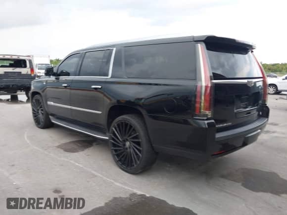 2015 Cadillac Escalade ESV Luxury with VIN 1GYS3SKJ4FR739291, listed as a IAAI auction lot 42334011 with 163,715 mi miles and . Bid and sale history available at DreamBid. Image 3.