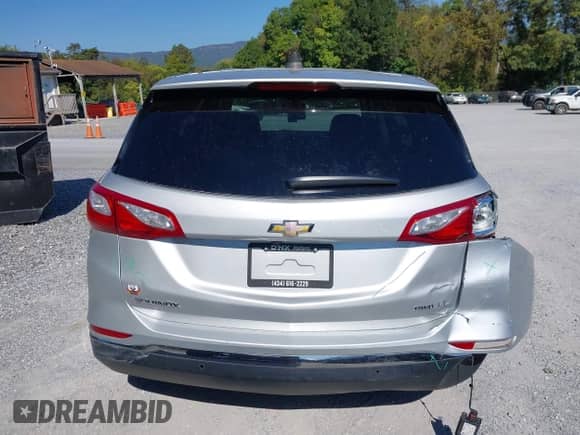 2018 Chevrolet Equinox LT z VIN 2GNAXSEV7J6311280, wystawiony jako IAAI lot #43268032 z przebiegiem 87 427 mil mil oraz . Historia ofert i sprzedaży dostępna na DreamBid. Obrazek 17.