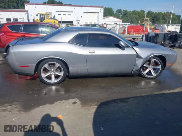 2015 Dodge Challenger SXT with VIN 2C3CDZAG3FH728387, listed as a IAAI auction lot 43222255 with 105,080 mi miles and . Bid and sale history available at DreamBid. Image 13.