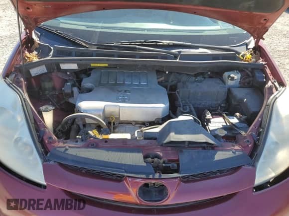 2010 Toyota Sienna LE z VIN 5TDKK4CC2AS309919, wystawiony jako Copart lot #82524135 z przebiegiem 196 955 mil mil oraz Szkoda całkowita • Salvage title. Historia ofert i sprzedaży dostępna na DreamBid. Obrazek 12.