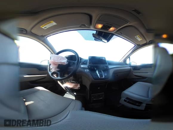 2020 Honda Odyssey EX-L with VIN 5FNRL6H77LB021095, listed as a IAAI auction lot 42581910 with 50,608 mi miles and . Bid and sale history available at DreamBid. Image 22.