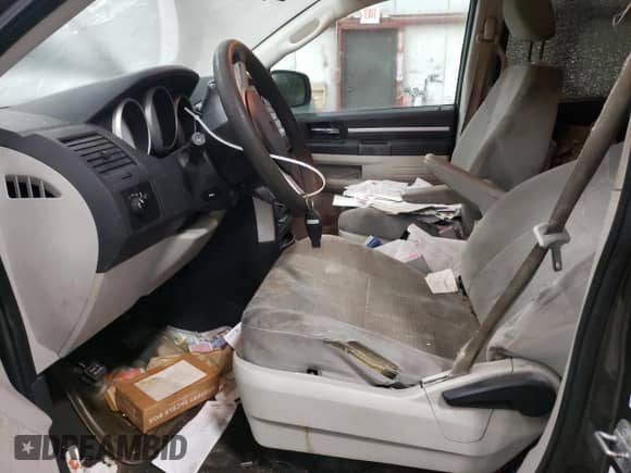 2010 Dodge Grand Caravan SE with VIN 2D4RN4DE6AR238807, listed as a Copart auction lot 58635385 with 144,796 mi miles and Non repairable. Bid and sale history available at DreamBid. Image 7.